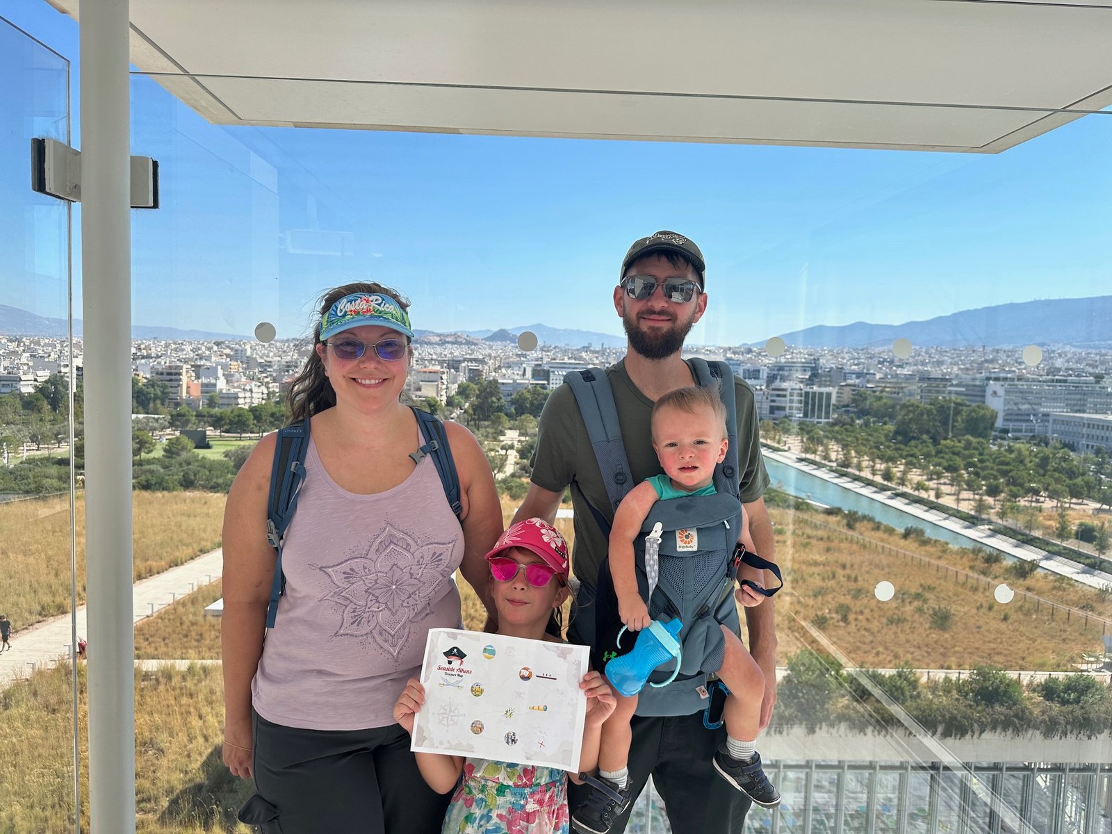 Family enjoying panoramic ocean views from the SNFCC rooftop in Athens — a perfect family-friendly stop on a Greece trip
