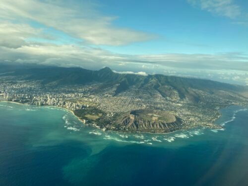 Aerial view of Oahu and Diamond Head crater after takeoff from Honolulu on a United 787-10 flight to Chicago